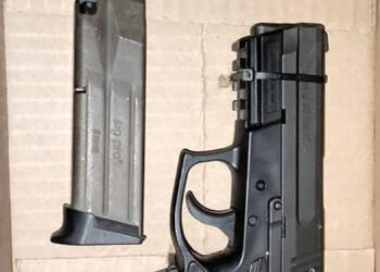 Portaba tremendo pistolón