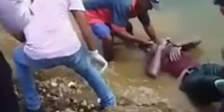 Localizan cadáver en el río