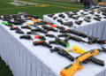 Como parte del programa “Sí al Desarme, Sí a la Paz”, niñas y niños entregaron réplicas de armas a cambio de juegos didácticos.